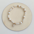 Pulsera de Perlas con Colgante de Flor